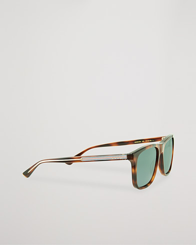 Herren | Gebogene Sonnenbrillen | Gucci | GG0381SN Sunglasses Havana/Blue