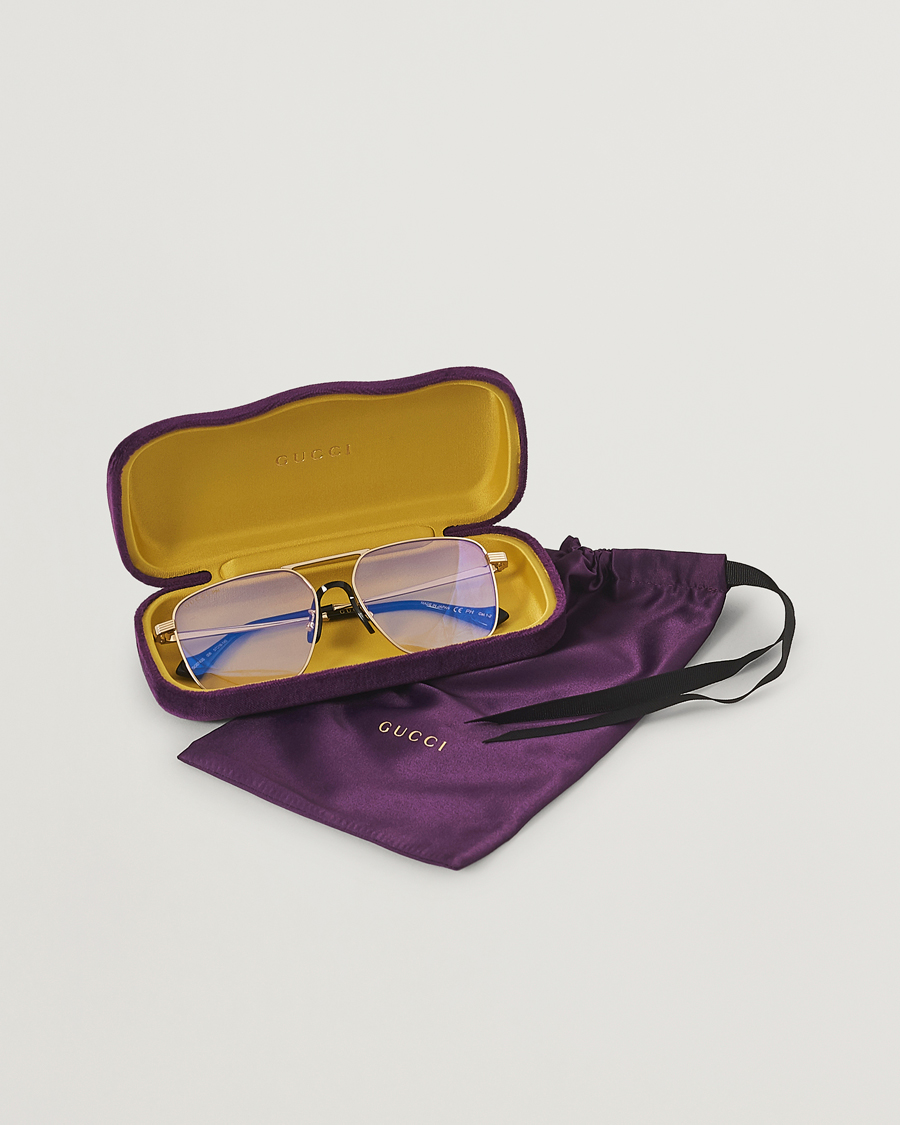 Herren | Gucci GG0743S Photochromic Sunglasses Shiny Endura Gold | Gucci | GG0743S Photochromic Sunglasses Shiny Endura Gold