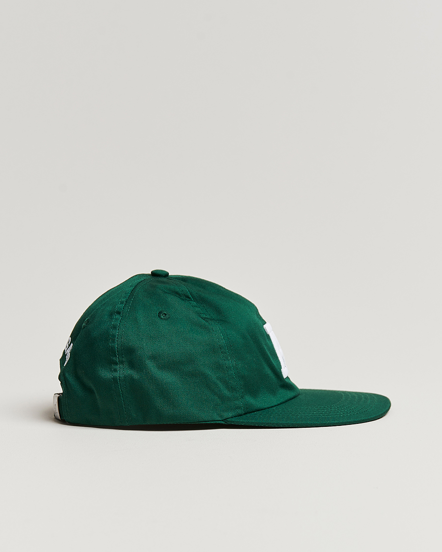 Herren | Axel Arigato Varsity A Flat Cap College Green | Axel Arigato | Varsity A Flat Cap College Green
