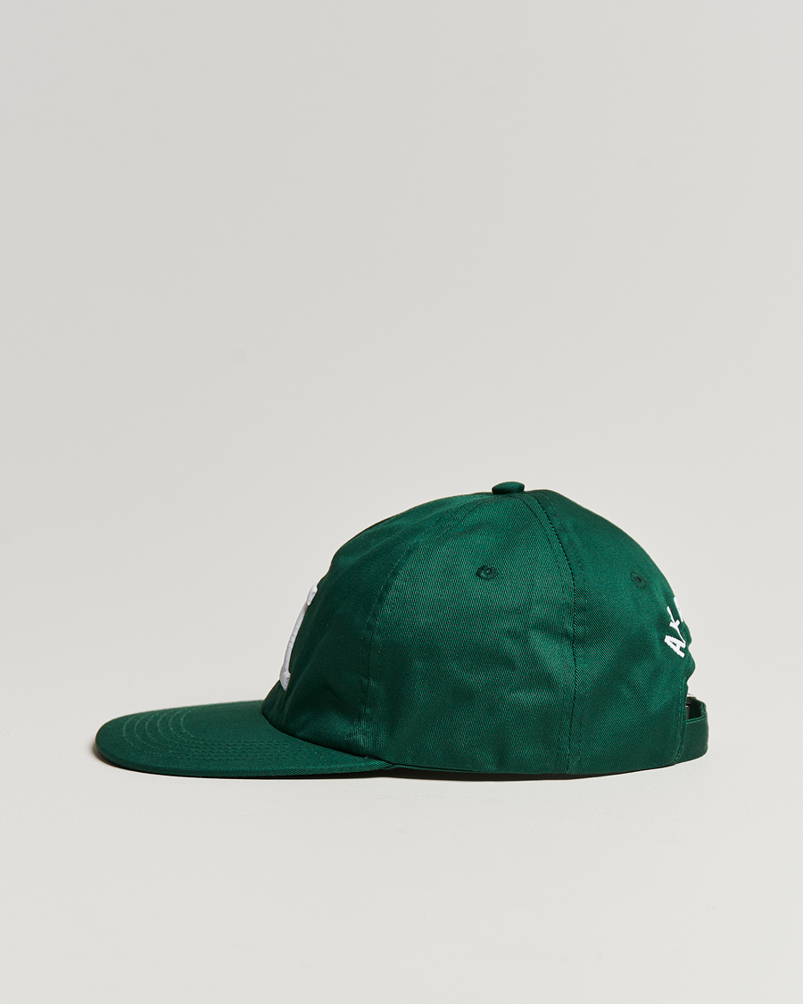 Herren | Axel Arigato Varsity A Flat Cap College Green | Axel Arigato | Varsity A Flat Cap College Green