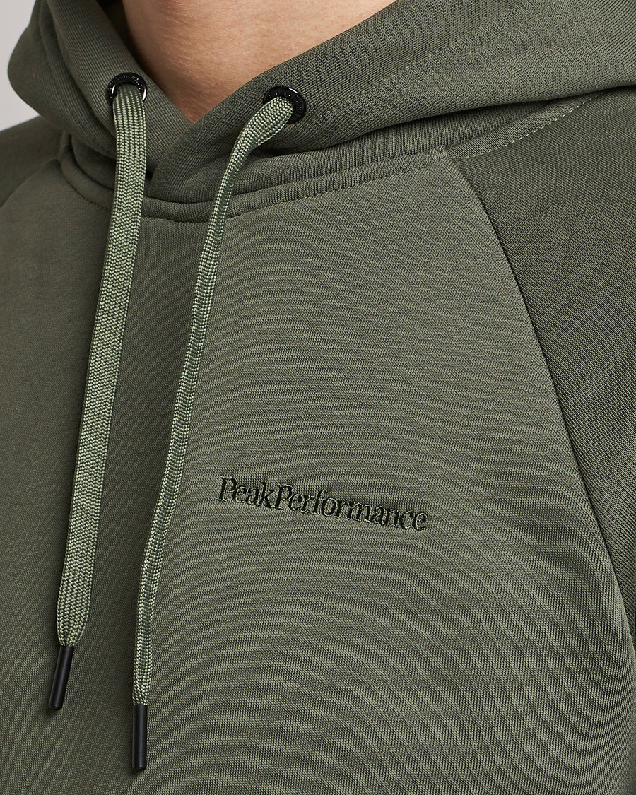 Herren | Pullover | Peak Performance | Original Small Logo Hood Pine Needel