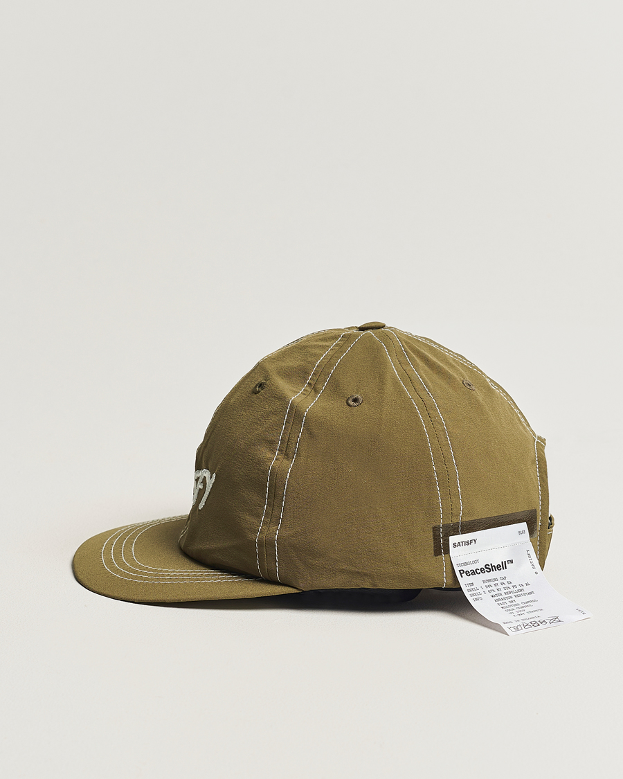 Herren | Satisfy PeaceShell Running Cap Oil Green | Satisfy | PeaceShell Running Cap Oil Green