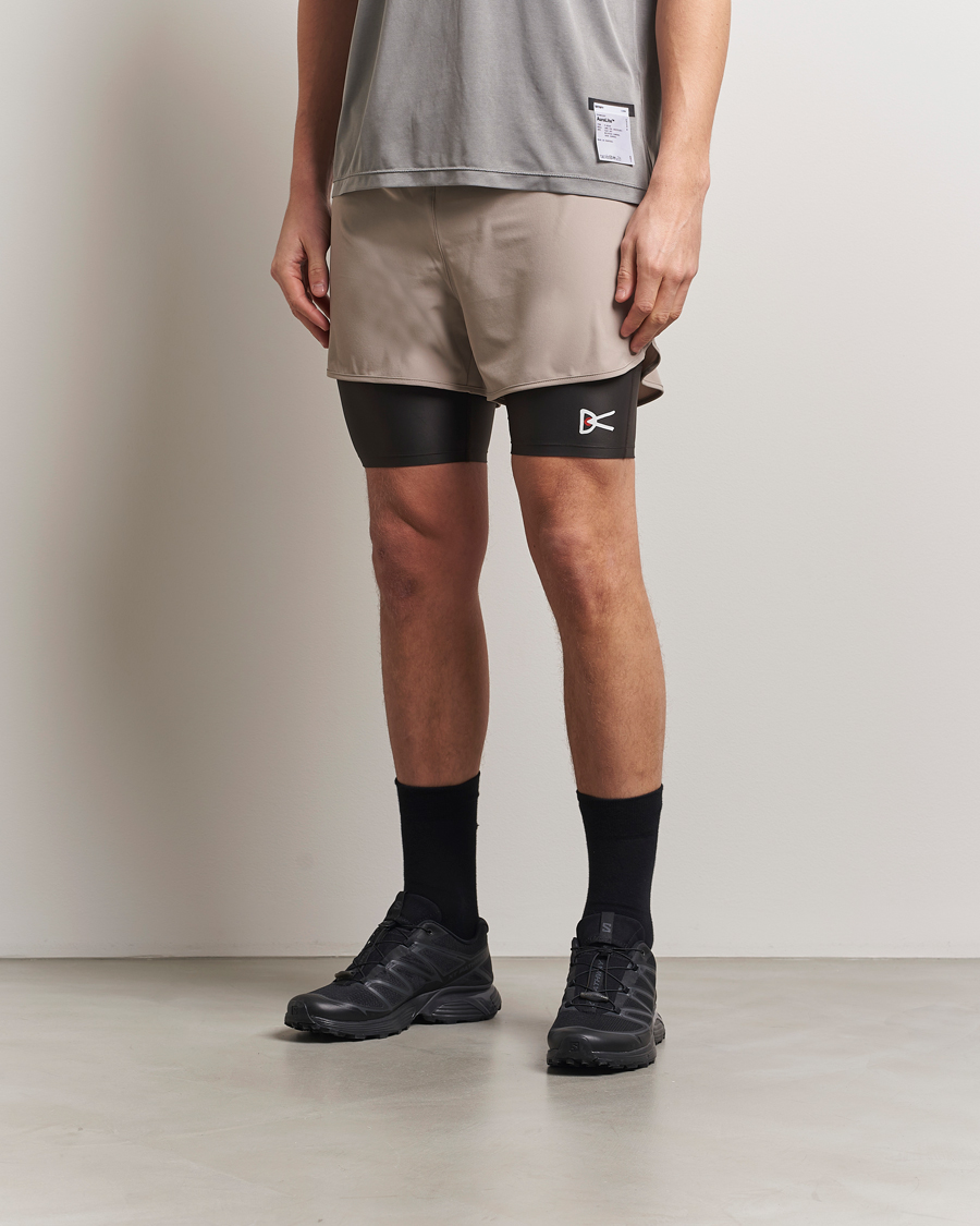 Herren | Shorts | District Vision | Layered Pocket Trail Shorts Khaki