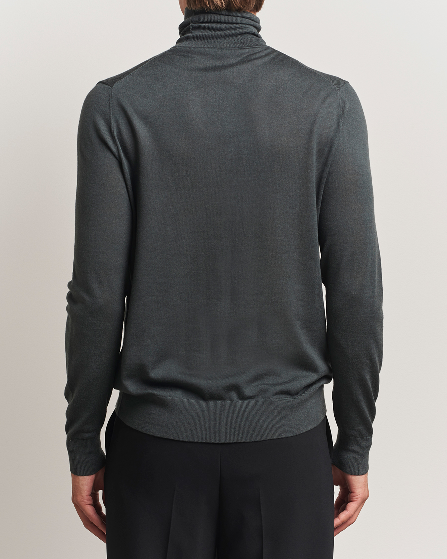 Herren | Pullover | Tiger of Sweden | Nevile Extra Fine Merino Polo Midnight Green